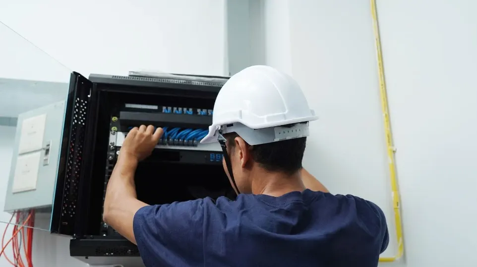 Fusion technician installing network equipment on site